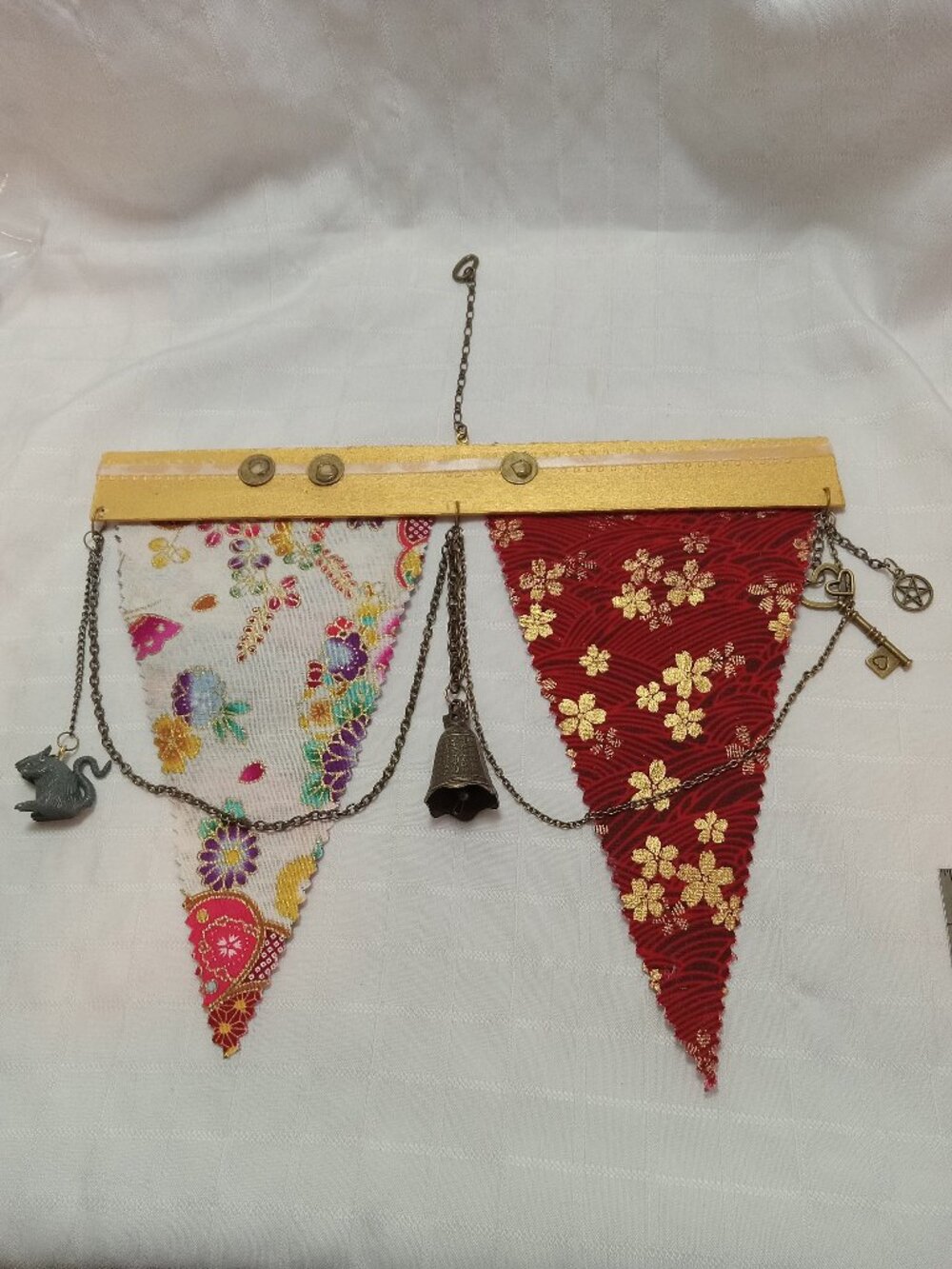 6-A reversible, handmade hanging banner made with fabric, chains, charms & coins